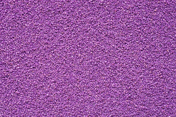 Purple sand extremal close up. Texture and background