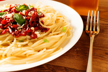 Italian dish - pasta with sundried tomato and basil