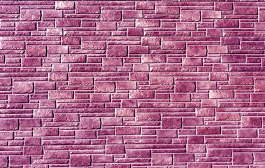 Fototapeta na wymiar Purple color brick stylized wall pattern.