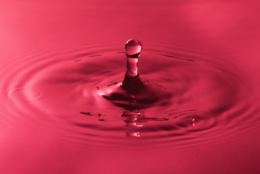Splash of water from falling drop red filter