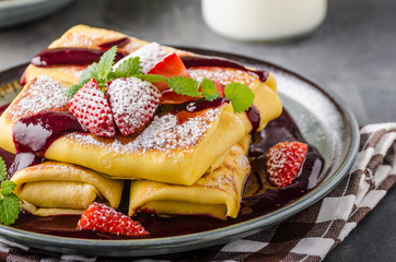 Filled pancakes with strawberries