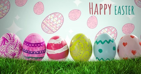 Happy Easter text with Easter eggs in front of pattern