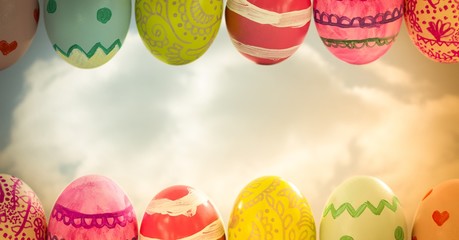 Easter eggs in front of cloudy sky