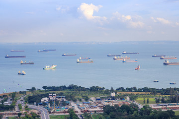 Boats waiting in front of Singapore Harbor in south east asia