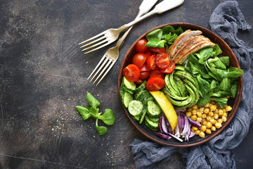 Lunch bowl with vegetables,beans and chicken meat.Top view.