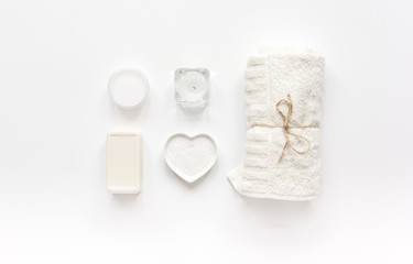 body care concept with white set of cosmetics woman desk top view