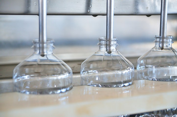 Sunflower oil. Factory line of production and filling of refined oil from sunflower seeds. Factory conveyor of food industry