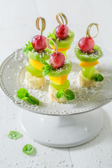 Homemade finger food with various fruits and mint for party