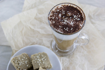 Latte halva. Unusual oriental hot coffee cocktail in a cafe