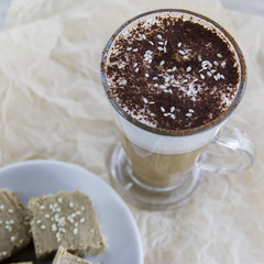 Latte halva. Unusual oriental hot coffee cocktail in a cafe