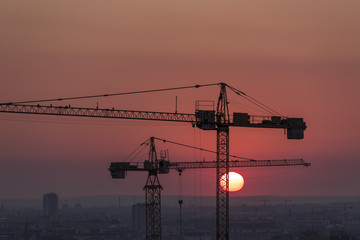 Crane over the urban landscape - real estate development