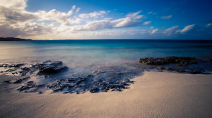 rocks on grace bay beach 