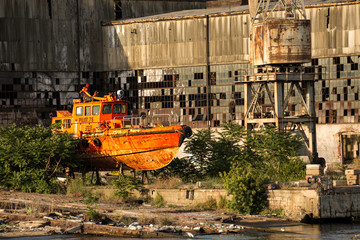 Fototapeta na wymiar Abandoned fishing ship on Bosphorus Strait shore
