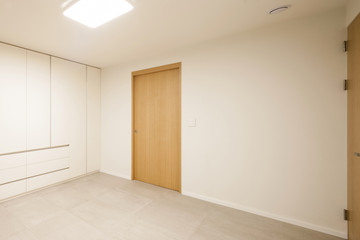 white empty room with wardrobe close for cleaning.