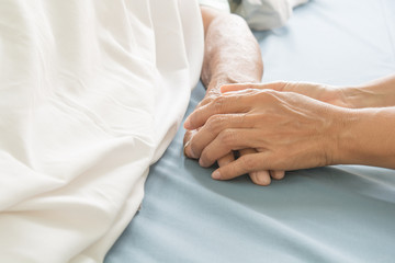 hospital patient hands to care