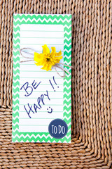 To Do List - Be Happy on straw mat background
