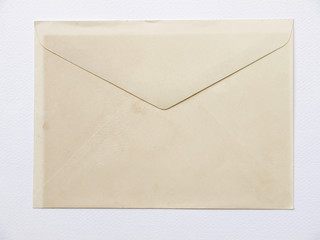 Old paper envelope on white background