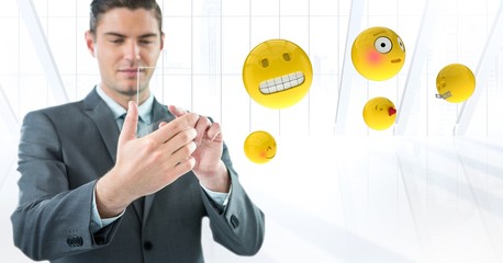 Business man with emojis against white window