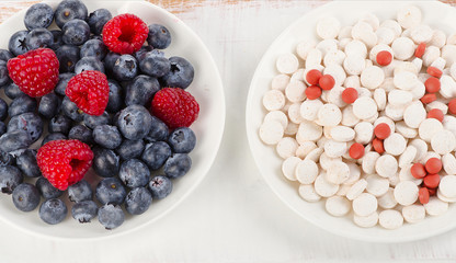Pills or fresh berries.