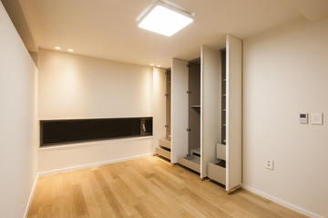 white empty room with wardrobe, window, door at the night.