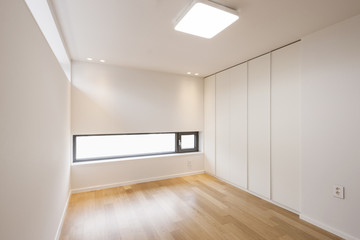 white empty room with window, wardrobe, door at the day.