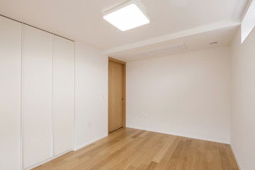 white empty room with window, wardrobe, door at the day.
