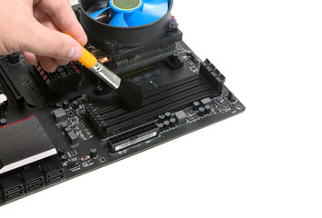 Maintaining the motherboard with a dust brush