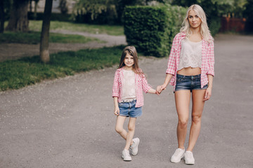 Obraz premium young family mother and daughter