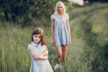 Fototapeta premium mom and daughter outside