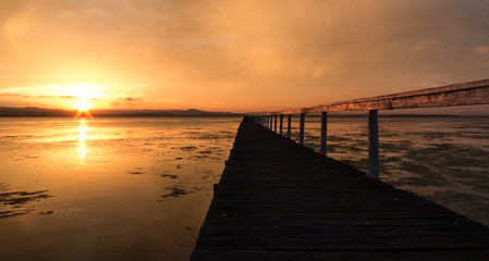 Obraz na płótnie Canvas Sunset with pier