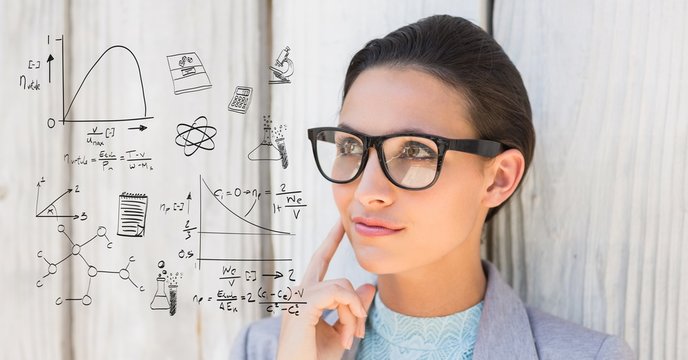 Thoughtful woman looking at math equations