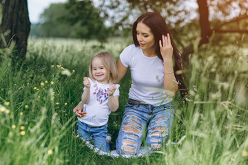 Fototapeta premium child near tree with mom