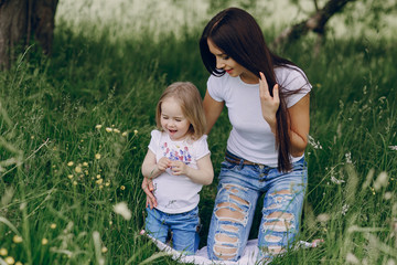 Fototapeta premium child near tree with mom