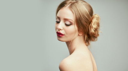 Portrait of a young lady with clean skin and hair