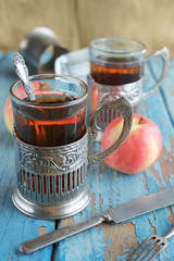 Glasses with tea and apples
