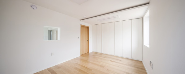 white empty room with wardrobe at the day.