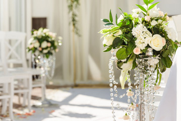 White wedding ceremony decorations indoor. Wedding when bad weather