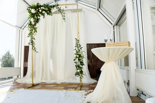 White wedding ceremony decorations indoor. Wedding when bad weather