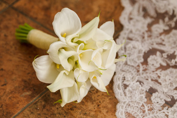 Fototapeta na wymiar Callas wedding bouquet in interior arrange