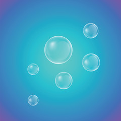 Realistic soap bubbles on a blue gradient background. Vector illustration.