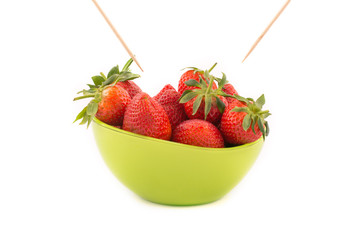 strawberries in a green bowl	