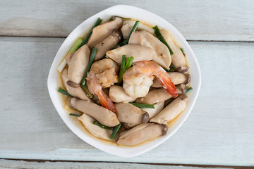 Stir-fried shrimp with pleurotus eryngii. Top view.
