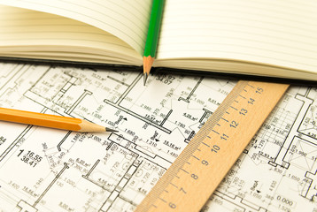 On the sheet of the drawing is a pencil with Notepad