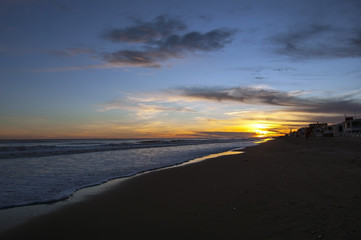 Fototapeta na wymiar Beach and sunset over atlantic