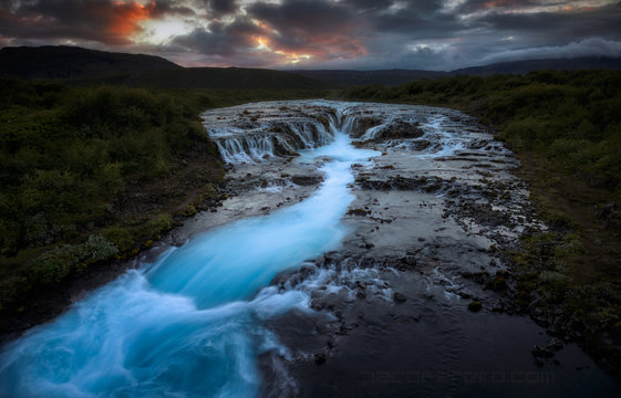 Bruarfoss waterfall at sunset
