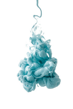 colorful ink isolated on white background. blue drop swirling under water. Cloud of ink in water. 