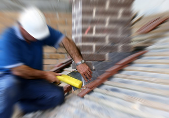Trainee roofer install lead flashing