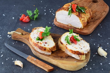 Sandwiches with roasted chicken breast on a olive wood cutting board. Healthy eating concept. Dieting
