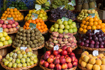 Naklejka na ściany i meble Fresh exotic fruits in Mercado Dos Lavradores. Funchal, Madeira, Portugal