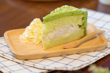 Pandan cake with young coconut butter cream.